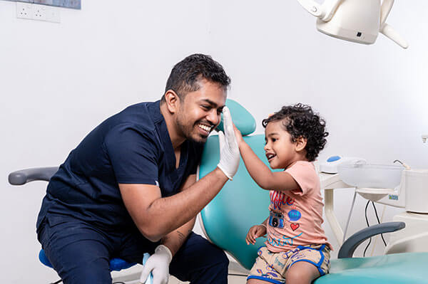 Doctor with the happy kid